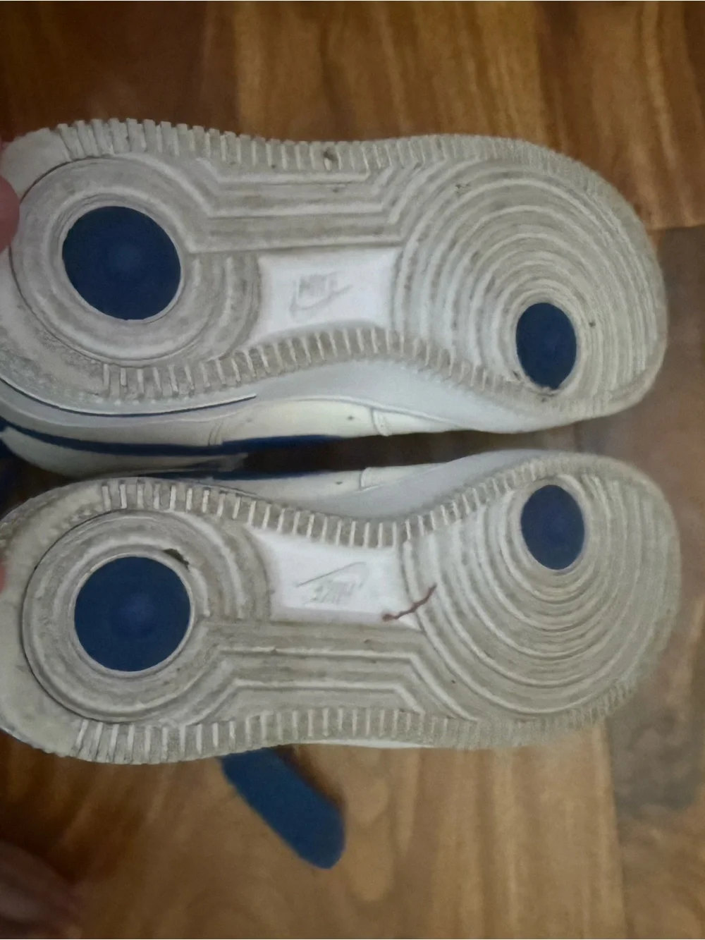 Nike White High-Top Sneakers with Blue Swoosh and Strap